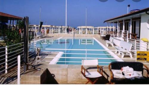 a large swimming pool on a cruise ship at Enjoy in Viareggio