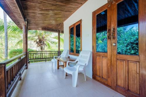 Balkón nebo terasa v ubytování Baan Rabieng Resort