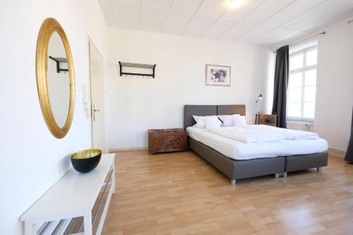 Ένα ή περισσότερα κρεβάτια σε δωμάτιο στο Elisabeth Apartments
