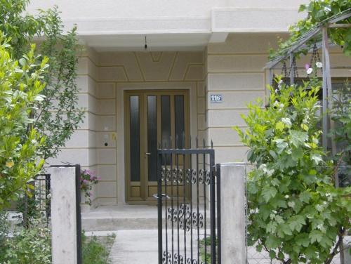 a front door of a house with a gate at Residence Krstanoski in Ohrid