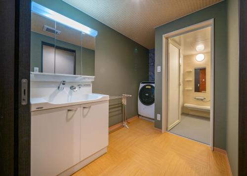 A bathroom at Residence Hotel Takayama Station
