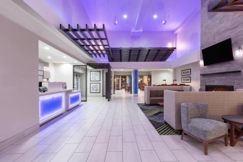 a lobby of a hospital with a waiting room at Holiday Inn Express Hotel & Suites Seaside Convention Center by IHG in Seaside
