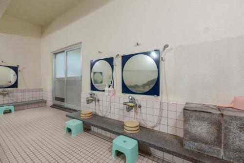 Kamar mandi di Tabist Spa Yubara Okayama Yubaraonsen