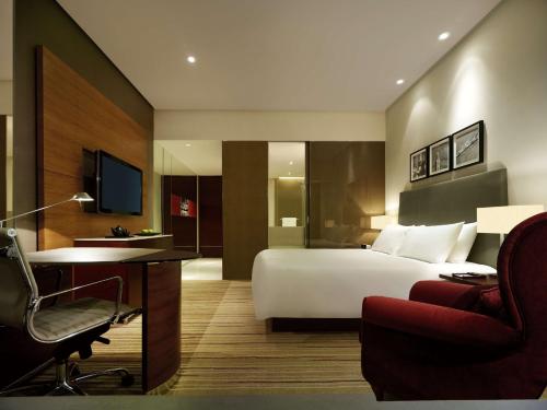 Télévision ou salle de divertissement dans l'établissement Hyatt Regency Hong Kong Tsim Sha Tsui