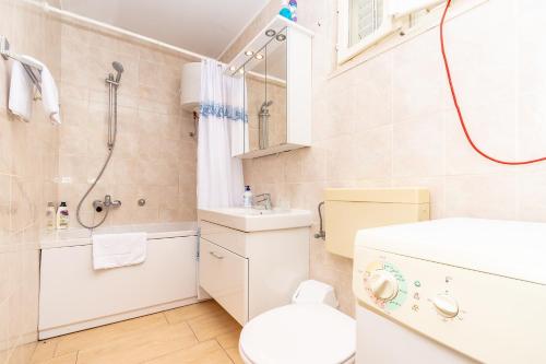 Kylpyhuone majoituspaikassa Apartments Peco