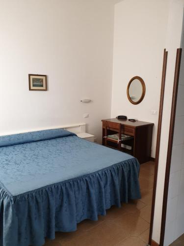 Кровать или кровати в номере Sabini Rentals - Affittacamere