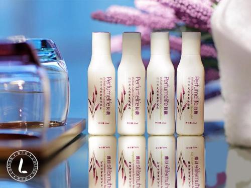 a group of four bottles sitting on a table at Lavande Hotels·Kunshan Renmin Road in Suzhou