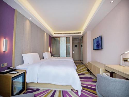 เตียงในห้องที่ Lavande Hotel Xi'an Bell Tower