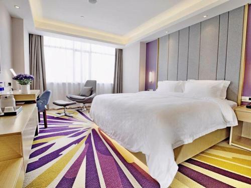 Katil atau katil-katil dalam bilik di Lavande Hotels·Foshan Bijiang Light Rail Country Garden Headquarters