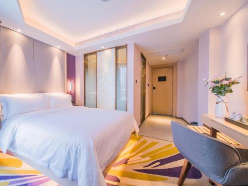 Lova arba lovos apgyvendinimo įstaigoje Lavande Hotels·Zhuhai Qinglv Middle Road Opera House