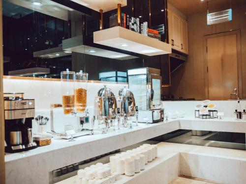 Kuchyň nebo kuchyňský kout v ubytování Lavande Hotel Suzhou High Speed Rail North Station