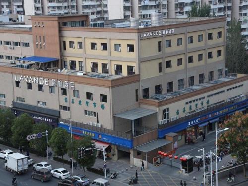an overhead view of a building in a city at Lavande Hotels·Nanjing South of Olympic Stadium Daishan New Town in Nanjing