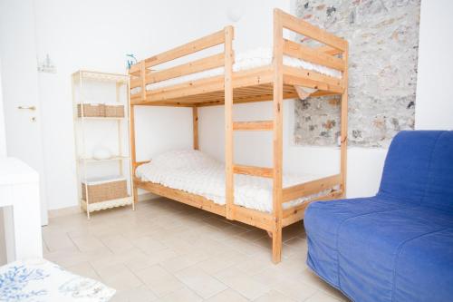 Ένα ή περισσότερα κρεβάτια σε δωμάτιο στο La Casa della Tilde