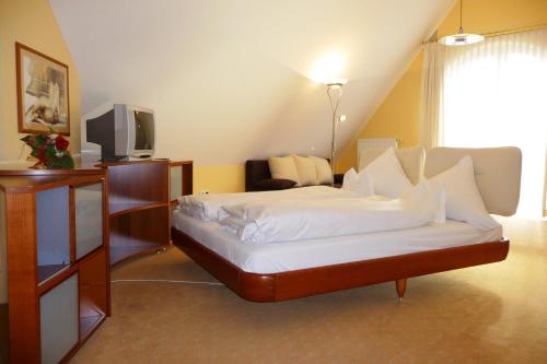 Postel nebo postele na pokoji v ubytování Hotel Bachwiesen