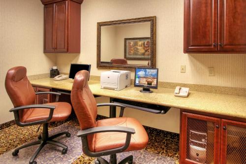 an office with a desk with two chairs and a printer at Holiday Inn Express Hotel & Suites Las Cruces by IHG in Las Cruces