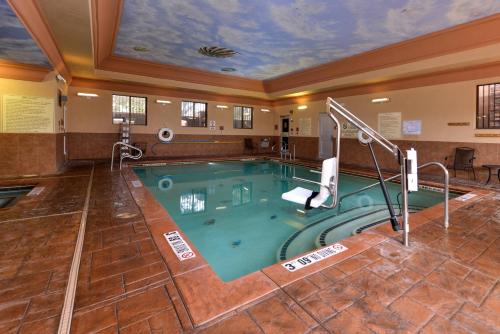 a large indoor pool in a hotel room at Holiday Inn Express Hotel & Suites Las Cruces by IHG in Las Cruces