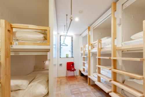 Postel nebo postele na pokoji v ubytování plat hostel keikyu haneda home