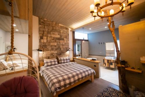 Postel nebo postele na pokoji v ubytování QBE B&B