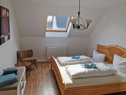 Кровать или кровати в номере Ferienwohnung Martina