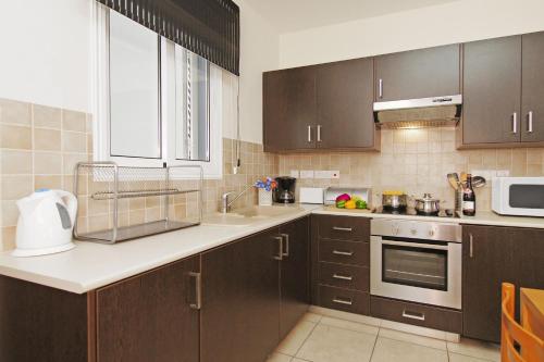 Dapur atau dapur kecil di Apartment Mariada