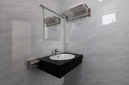 Koupelna v ubytování Lien Thuy Hotel