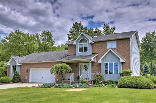 a brick house with a garage at Charming Lewiston Apt 10 Miles to Niagara Falls! in Lewiston