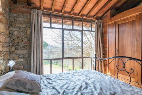 Ένα ή περισσότερα κρεβάτια σε δωμάτιο στο Villa Il Noce