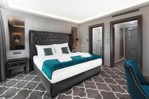 Ένα ή περισσότερα κρεβάτια σε δωμάτιο στο Hotel Zlaty Klucik, 4 Stars Superior