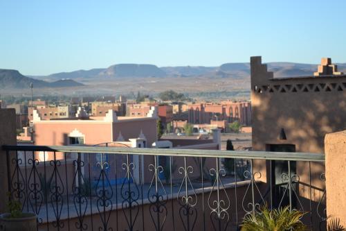 a view of a city from a balcony at Riad Dar Bergui in Ouarzazate