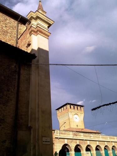 a clock tower on top of a building at Hotel Select in Montecchio Emilia