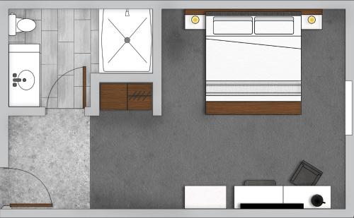 a floor plan of a living room with at Hotel Millwright in Amana