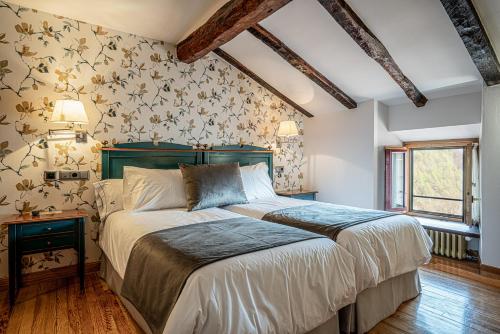 Postel nebo postele na pokoji v ubytování Hotel Venta de Ulzama
