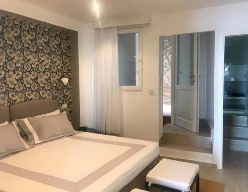 A bed or beds in a room at Les Lilas