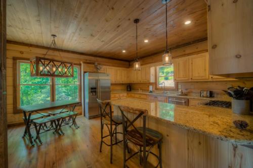 Køkken eller tekøkken på Sleepy Bear Hideaway