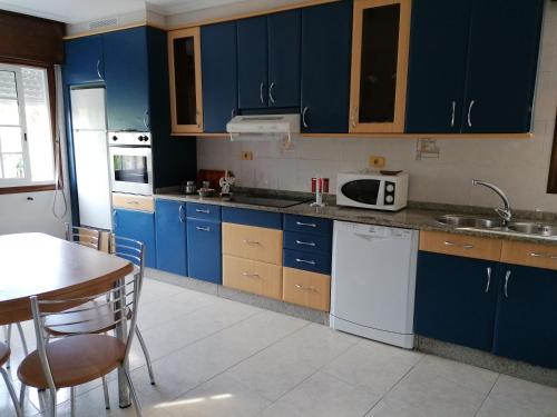 Kuchyň nebo kuchyňský kout v ubytování Casa Ribe