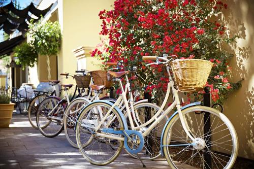 bicycles are parked in front of a building at Bespoke Inn Scottsdale in Scottsdale