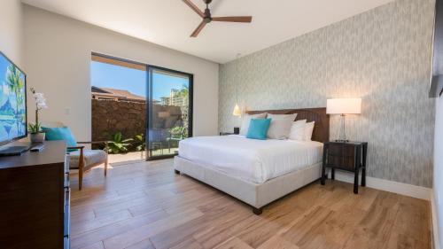 Postel nebo postele na pokoji v ubytování Maui Westside Presents - Luana garden Villa 8B
