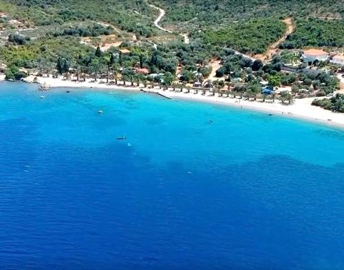 an aerial view of a beach with blue water at Lavender Cottage in Trpanj
