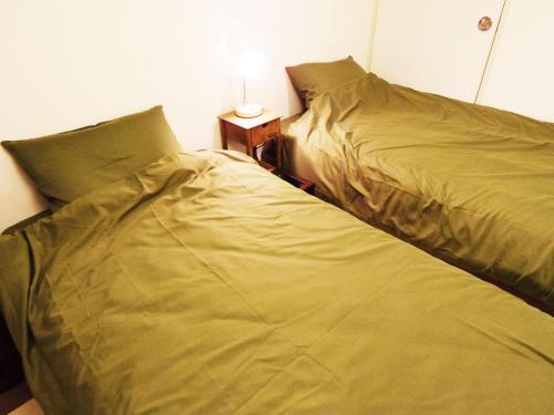 Katil atau katil-katil dalam bilik di ☆Cozy Japanese style room☆