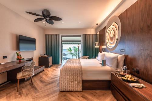 TV a/nebo společenská místnost v ubytování Le Meridien Ile Maurice