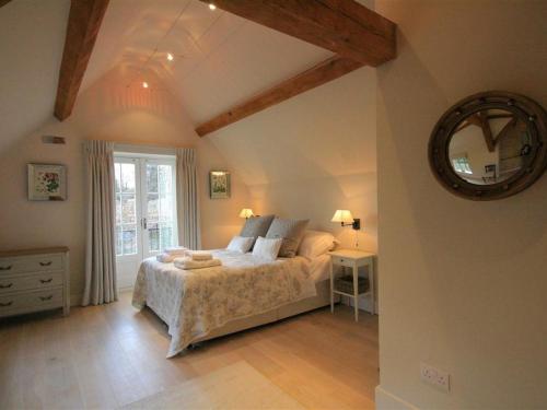 Katil atau katil-katil dalam bilik di Hillside Cottage