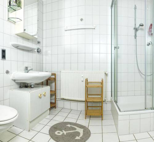 Bilik mandi di Appartements Am Reiterhof Am Reitstall