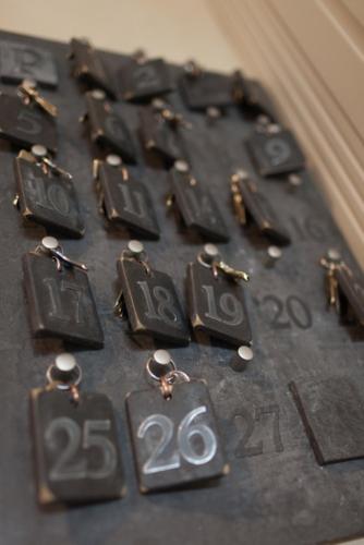a bunch of metal numbers on a table at Hotel La Passerelle in Grandhan