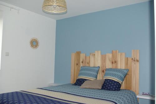Katil atau katil-katil dalam bilik di Entre mer et remparts