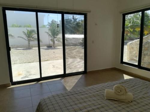 Spacious, sunny and private retreat by the beach