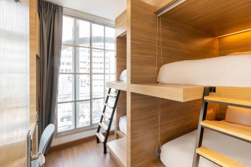 Postel nebo postele na pokoji v ubytování Atnest Hostel