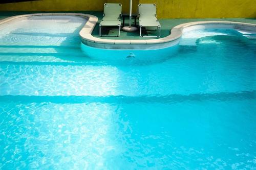 สระว่ายน้ำที่อยู่ใกล้ ๆ หรือใน Hotel Motel Residence S