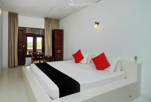 Voodi või voodid majutusasutuse Kalla Bongo Lake Resort toas