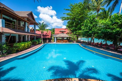 a swimming pool in front of a resort at Nice Beach Resort Koh Pha-ngan in Thong Nai Pan Yai