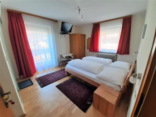 Postel nebo postele na pokoji v ubytování Haus Christine